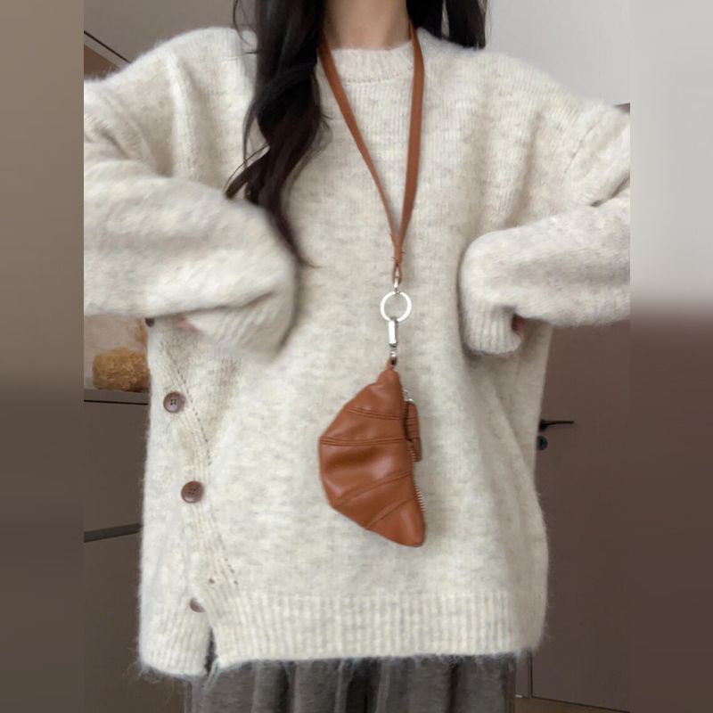 丸首サイドボタンデザインゆったりニットトップス